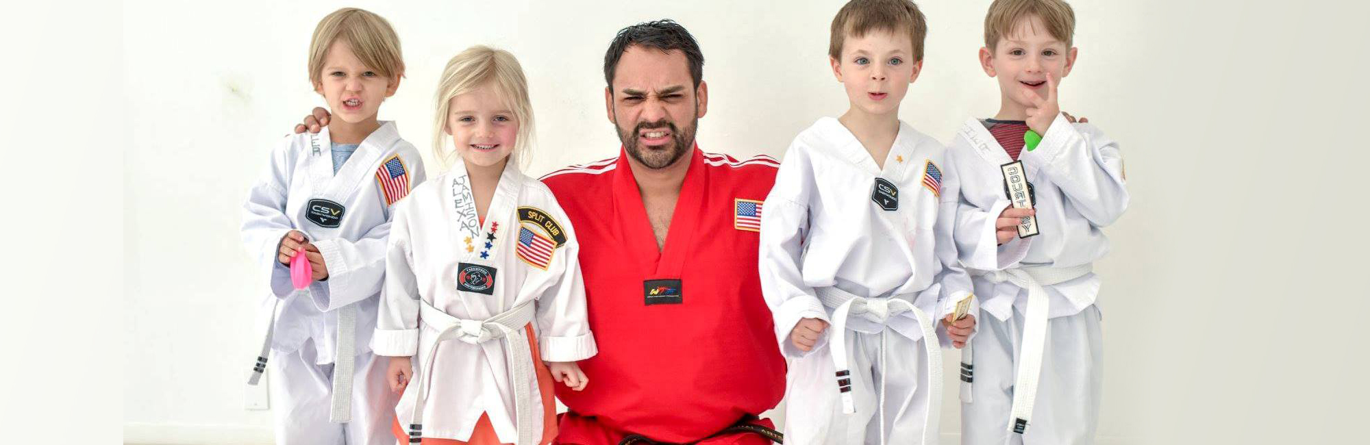 children with martial arts instructor